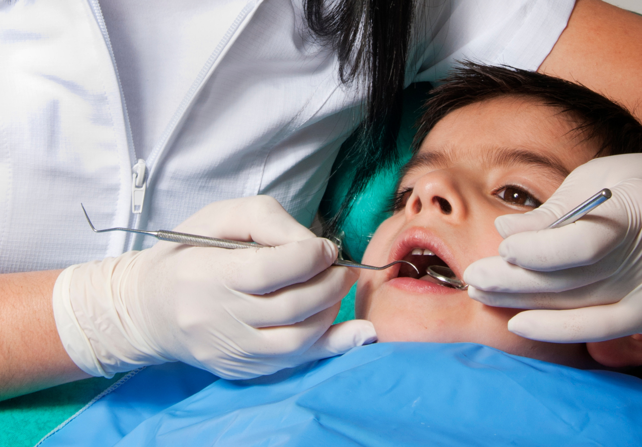 Image of child at dentist